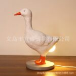 O1CN010eIz572Gi2WHjFqzg_2209606839048-0-cib.jpg New cross-border style Easter white rooster lamp, artificial chicken ornament, resin design table lamp bulb.