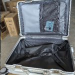 f166a8bf62d649adbdf386b83b4f48a2.png Factory wholesale 20-inch front-opening aluminum frame trolley case, stylish student carry-on suitcase with combination lock, gift set.