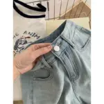 High-Waist Bow-Embroidered Blue Denim Shorts with Pockets