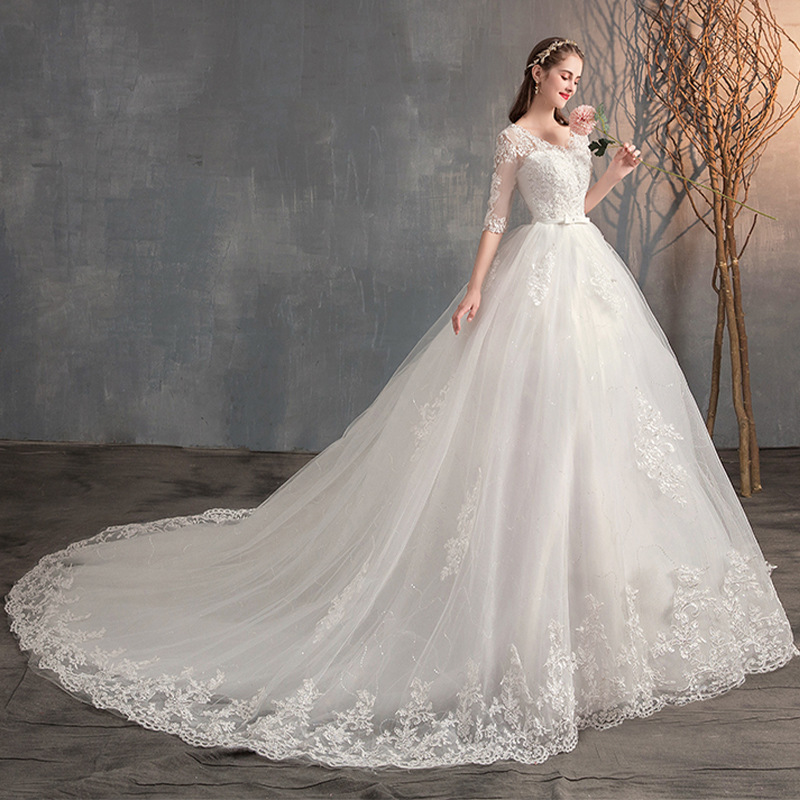 Deep V-Neck Lace Wedding Dress with Long Sleeves Tail