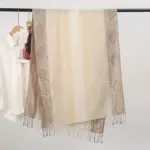 0e636560-4a1f-4ddf-ab4a-b7bbfcd1b1e8.webp Breathable Apricot Jacquard Tassel Shawl for Sun Protection