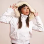 Warm Women’s Short Jacket with Fur-Trim Hood