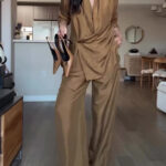 1b23ff58-6ead-4fed-bb00-e470ffc2b5d3.jpg Elegant Satin Wrap Blouse and Wide-Leg Pants Set