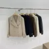 Elegant Women’s Wool Coat with Button Detail and 3 D Pattern