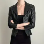 268740dd-826c-4c00-89be-cee687106fe3.webp Dark Style Short Black Leather Jacket for Women, V-Neck Lapel