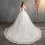 Deep V-Neck Lace Wedding Dress with Long Sleeves Tail