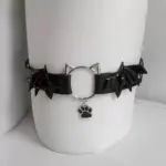 3d9a1963-b0ef-458f-96f8-3ef9f0cb0ed7.webp Bold Punk Leather Choker with Dark Cross & Devil Wings