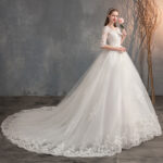 Deep V-Neck Lace Wedding Dress with Long Sleeves Tail