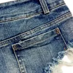 49316d9f-5c5e-4b8f-aabf-abfee7475098.webp Women's Low-Waist Ripped Denim Shorts