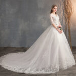 Deep V-Neck Lace Wedding Dress with Long Sleeves Tail
