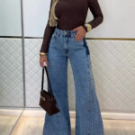 Light Blue High-Waisted Flared Jeans with Patchwork Details
