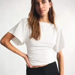 Womens Fashionable Casual T-Shirt With Batwing Sleeves And Waist Pleating