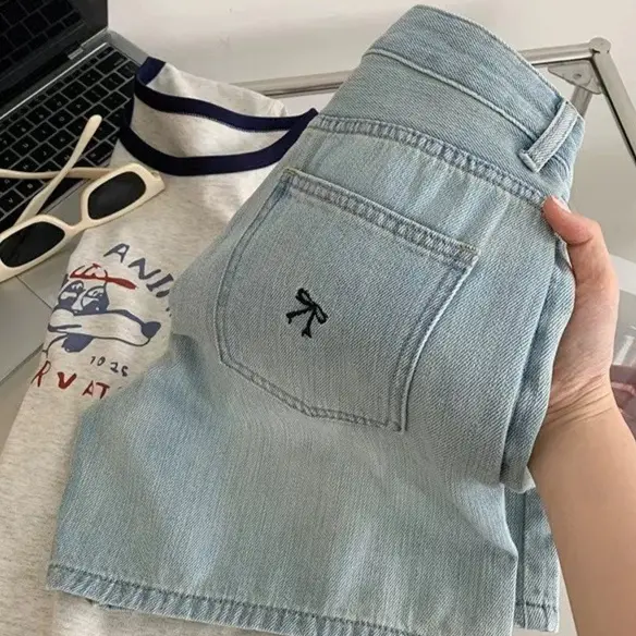 High-Waist Bow-Embroidered Blue Denim Shorts with Pockets