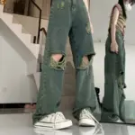 98c51655-8bc1-4f43-95dc-bcbb93155325.webp Bold Dark Green Wide-Leg Torn Denim Jeans, High Waist