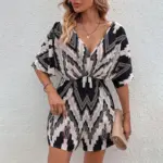 a7cee6ae-9f8f-40df-ada7-cb10016b5bde.webp Women's Printed V-neck One-piece Sleeve Loose Jumpsuit