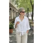c956fbe5-5dc9-426a-9a49-47a50b626a57-1.webp Buttoned V-Neck Lace-Up Shirt with Pockets for Women