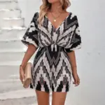 d81f93a5-9f7f-42cd-86dc-50c9800ca113.webp Women's Printed V-neck One-piece Sleeve Loose Jumpsuit