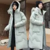 Warm Women’s Mid-Length Puffer Jacket with Detachable Hood Warm Women’s Mid-Length Puffer Jacket with Detachable Hood