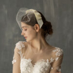 f596f9ee-d975-4ead-a6fd-05e8886a1d59.jpg European And American White Mesh Bow Veil