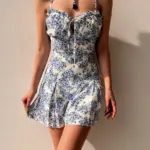 f931c4e8-bf06-43bf-abb7-766c216b9a4c.webp Floral Pleated Polyester Romper with Adjustable Rope Waist